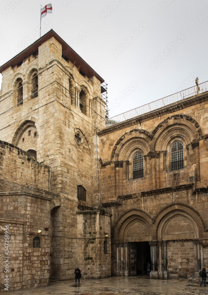 Facade of the Basilica of the Holy Sepulcher in Jerusalem, Israel, on which there is a ladde