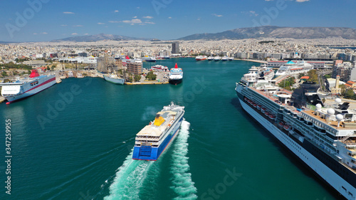 Aerial drone photo of passenger ferry reaching destination - busy port of Piraeus, Attica, Greece © aerial-drone