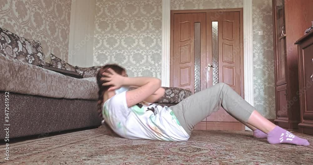 Caucasian young woman practicing at home during coronavirus pandemic with word Stay Home. video 4k resolution