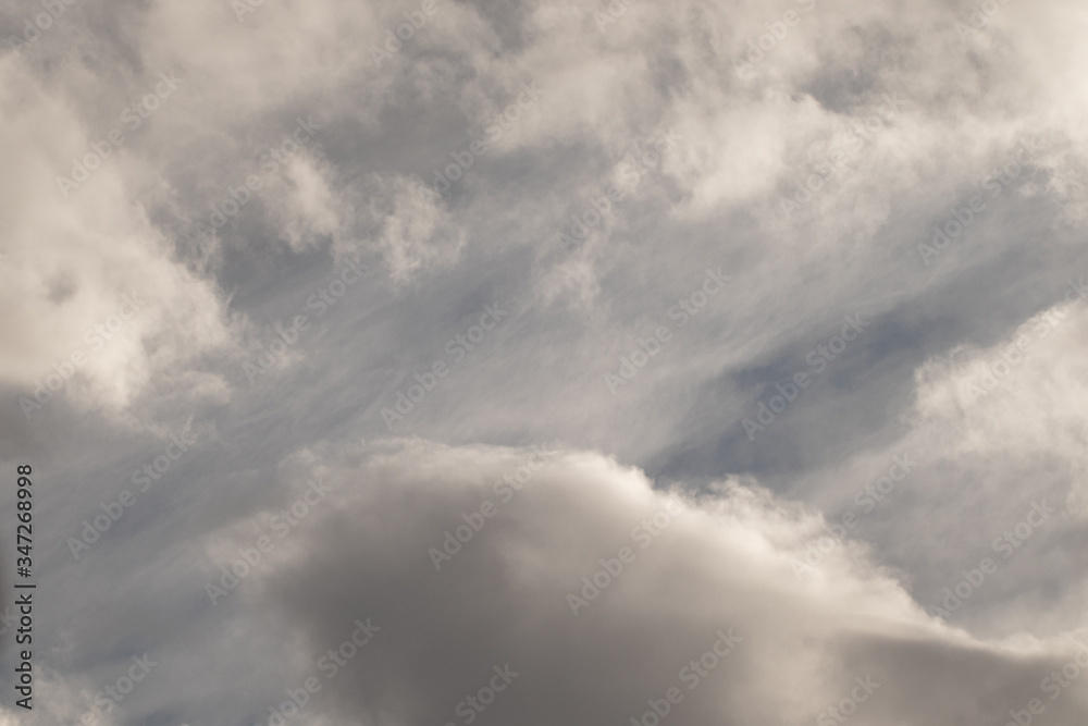 Obraz premium blue sky with many thick, dark clouds