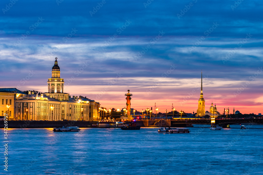 Saint Petersburg panorama. Russia. White nights in Petersburg. Embankment of St. Petersburg view from the Neva. Peter and Paul Fortress. Rostral columns. Night panorama of the Neva. Cities of Russia