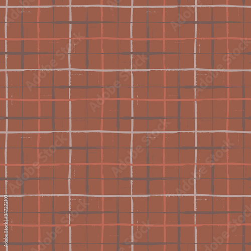 Vector plaid seamless pattern background. Organic painterly brush stroke effect criss cross grid backdrop. Repeat tartan fabric style in warm brown tones. All over cloth print for fabric, textile