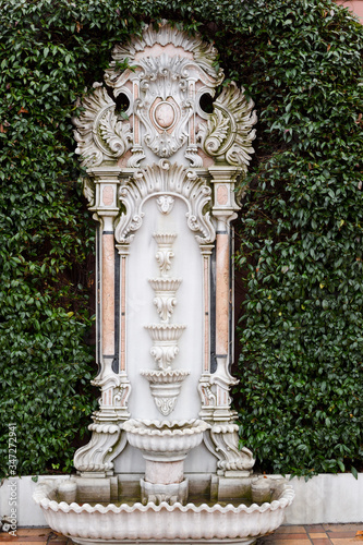 Photography White marble sculpted wall fountain at the entrance to bath-house of Haseki Hurr