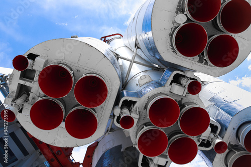 space rocket engine nozzles blue sky background