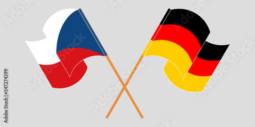 Crossed and waving flags of Czech Republic and Germany