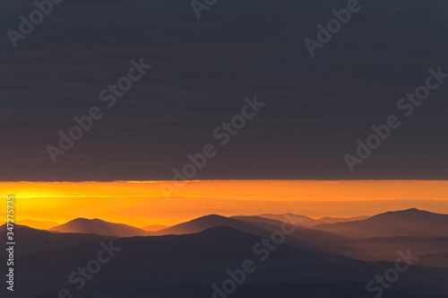 Red sunrise in the mountains. Babia Gora Poland.