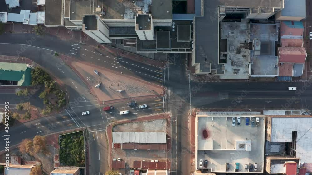 Top view following cars driving in the the streets of Johannesburg, South Africa on a quiet day in the city. 