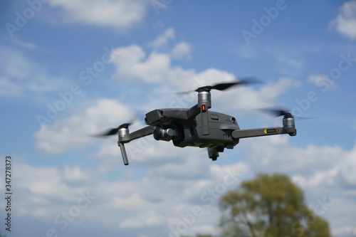 Fototapeta Naklejka Na Ścianę i Meble -  Drone caught in air while flying 