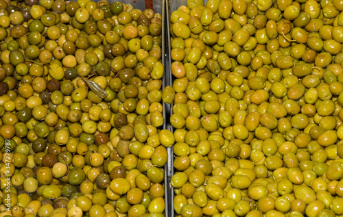 Turkish olives different mix for sale in Grand Bazaar, Egyptian outdoor market. Fresh produce photo