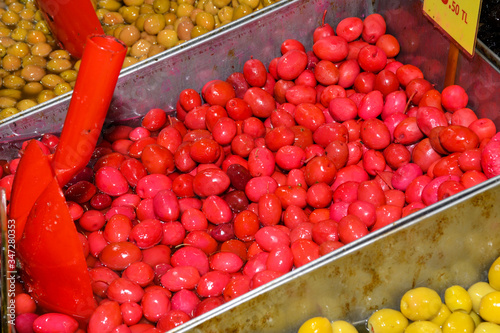 Turkish olives different mix for sale in Grand Bazaar, Egyptian outdoor market. Fresh produce photo