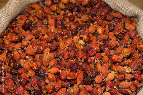 Dried rose hip or rosehip, also called rose haw and rose hep, is the accessory fruit of the rose plant. photo