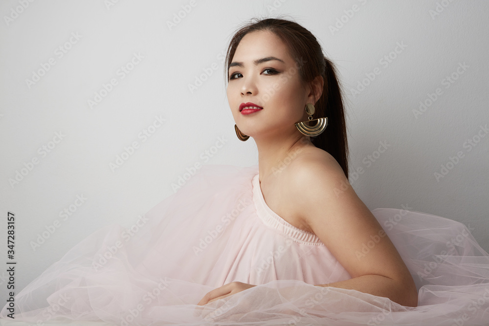 Close-up portrait of young beautiful asian woman with perfect glow skin dress up. Bridal concept. Close-up portrait of young beautiful asian woman with perfect glow skin dress up. Bridal concept.