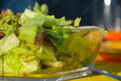 salad in a glass bowl in sunlight 