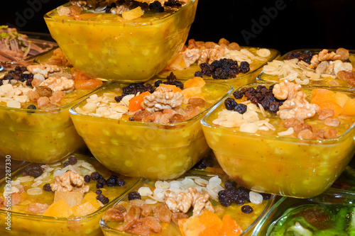 Zerde is a Turkish dessert, a sort of sweet pudding from rice that is colored yellow with saffron. photo