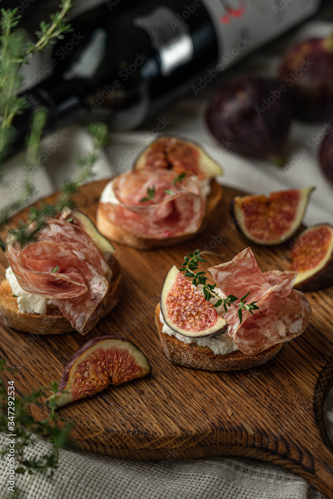 Salami and figs on a bread