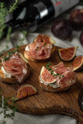 Salami and figs on a bread