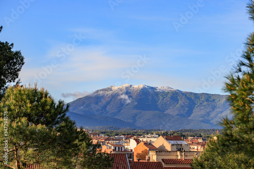 A panoramic view on snowed Montseny mountain from Cardedeu hills, in vallés oriental region, near Barcelona, Catalonia, Spain. photo