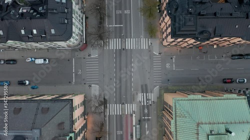 Rising aerial shot of empty intersection due to Covid 19 Coronavirus epidemic outbreak photo