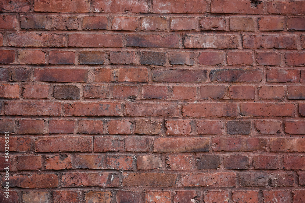 Urban architecture, old red brick wall background Urban architecture, old red brick wall background