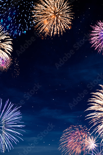 night sky with fireworks , new years background.