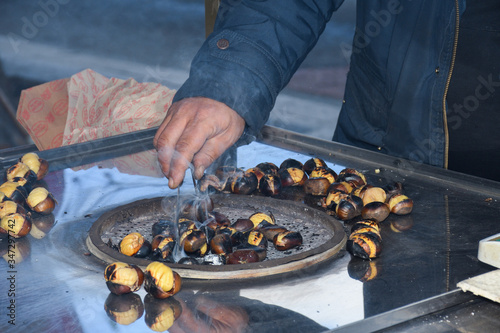 Photography Roasting chestnuts on a street stall in Istanbul, Turkey