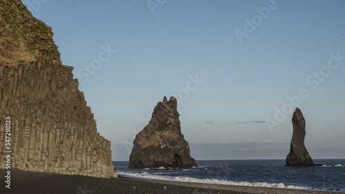The Reynisdrangar cliffs of the famous Reynisfjara Black Sand Beach of South Iceland.
