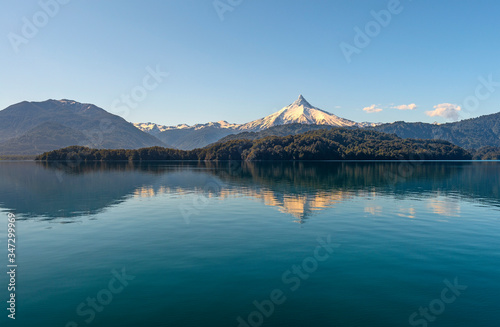 Fototapeta Naklejka Na Ścianę i Meble -  Reflection of the Puntiagudo Volcano at sunset in Lago Todos los Santos (All Saints Lake), Lake District near Puerto Varas, Chile.