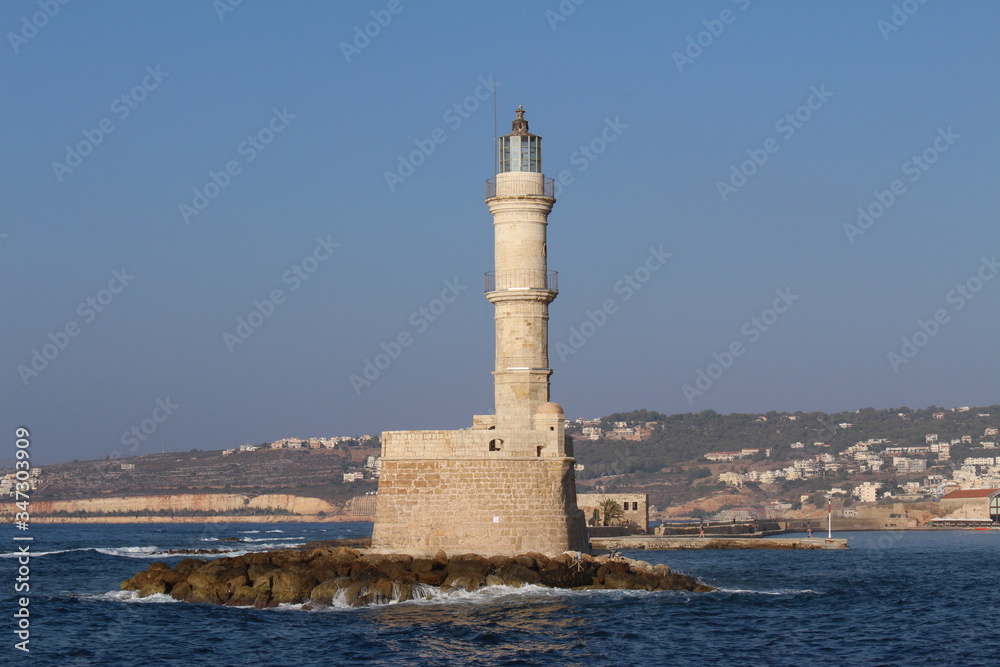 Lighthouse in the old Venetian Harbor of Chania, in Crete Island, Greece.