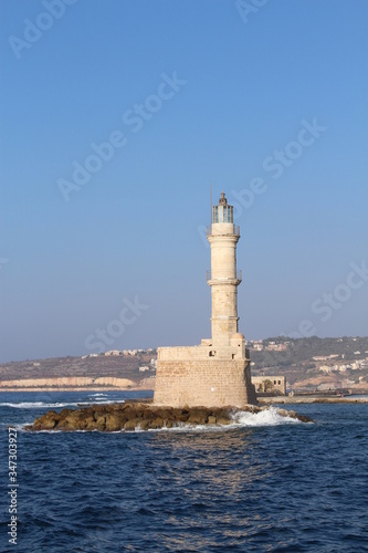 Lighthouse in the old Venetian Harbor of Chania, in Crete Island, Greece.