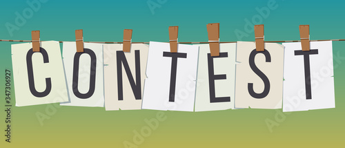 Word "Contest" attached with hairpins
