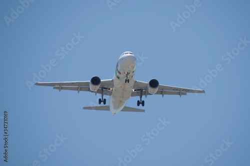 TAP Air Portugal Airbus A319 flying in Lisbon