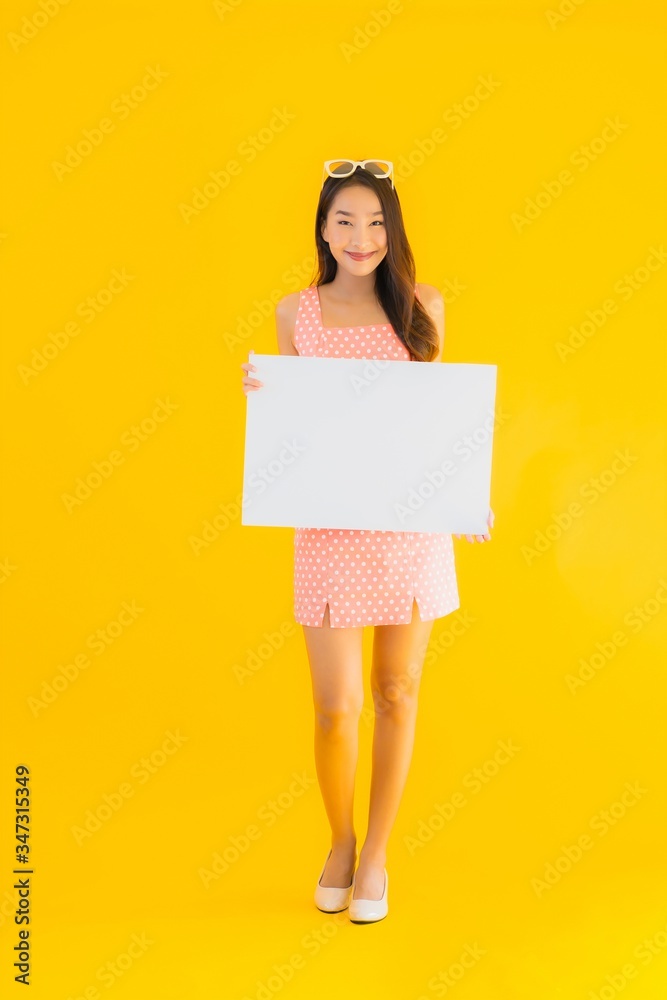Portrait beautiful young asian woman show empty white billboard Portrait beautiful young asian woman show empty white billboard
