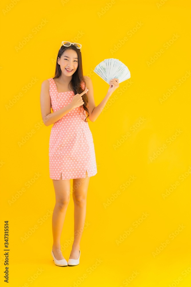 Portrait beautiful young asian woman show a lot of cash and money Portrait beautiful young asian woman show a lot of cash and money