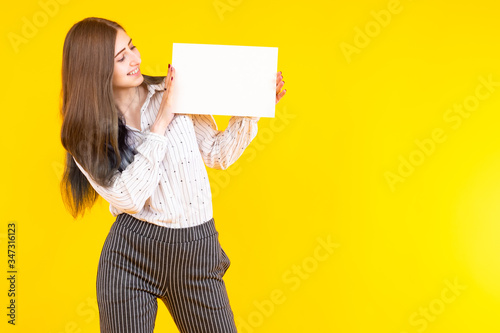 Woman shows a white sheet. ...