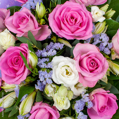 Pink bouquet of flowers from roses  carnations and lisianthus. 