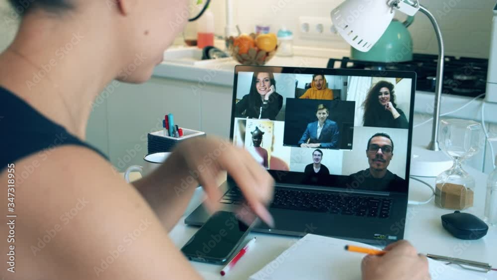 People work via videocall while staying home during pandemic. Zoom, videocall , video conference, online meeting, working remotely concept.