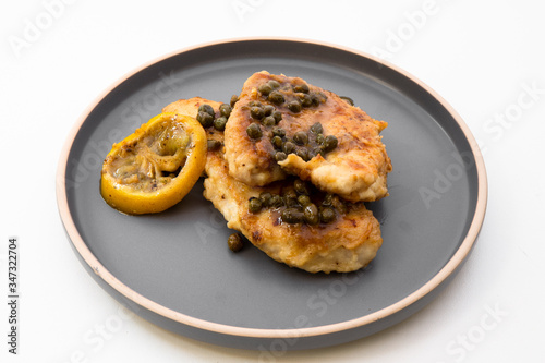 Italian food Lemon chicken Piccata © GEOLEE