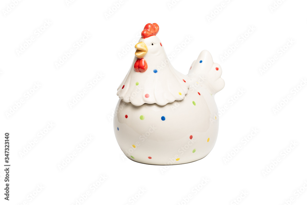 White ceramic rooster figurine with colored dots on body feathers isolated on white background. Concept of home decoration, happy Easter, year of cock. White ceramic rooster figurine with colored dots on body feathers isolated on white background. Concept of home decoration, happy Easter, year of cock.