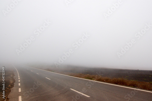 road with thick fog and overhead space