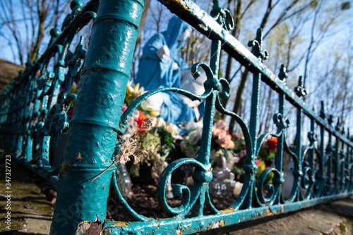 
Religious sculpture showing the figure of Mary holding Jesus after being removed from the cross in the park.