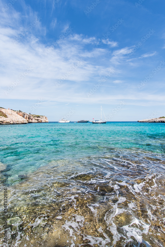 Fototapeta premium Sky, sea and boats landscape. Cala Varques, Majorca