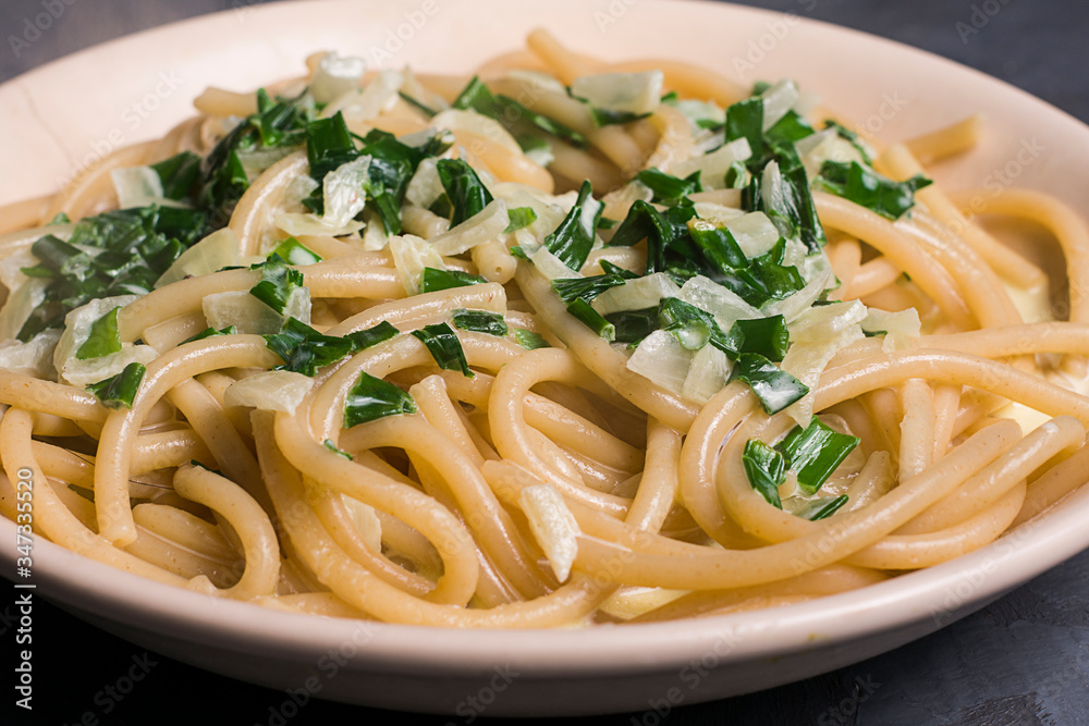 Pasta with Welsh onion and cream sauce. Delicious dish. Pasta with Welsh onion and cream sauce. Delicious dish.