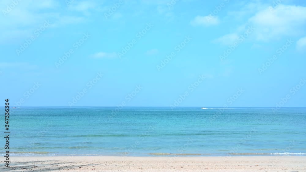 Tropical beach waves break on tropical white sand beach Thailand,4K footage Tropical beach waves break on tropical white sand beach Thailand,4K footage