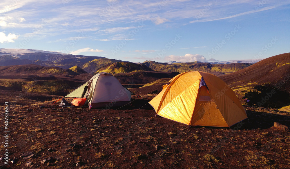 tent in the mountains at sunrise - Laugavegur trail, Iceland tent in the mountains at sunrise - Laugavegur trail, Iceland