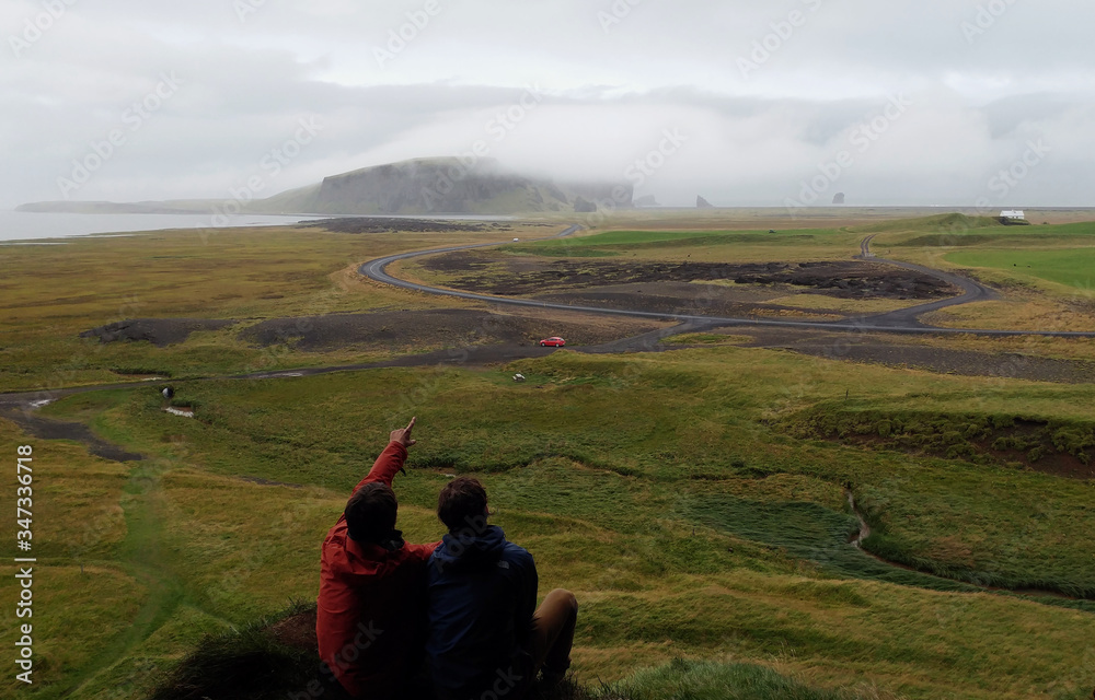 People looking the fog and mountains in southern Iceland