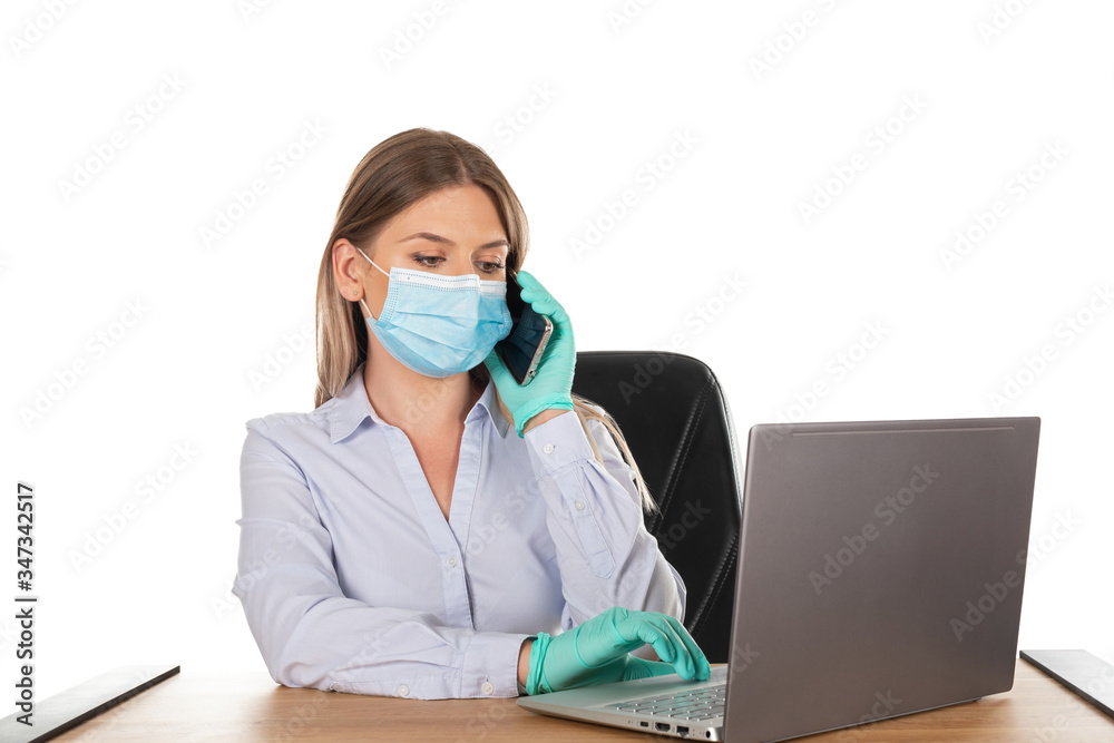 Business woman with mask at work - isolated Business woman with mask at work - isolated