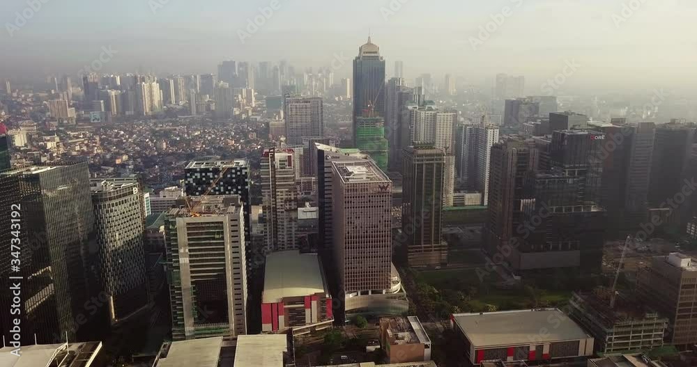 Straight aerial flight towards metropolitan city's high rise buildings. Drone, 4K. Straight aerial flight towards metropolitan city's high rise buildings. Drone, 4K.