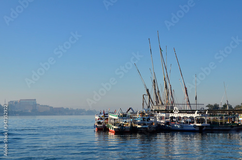 Fishing boat moored against a beautiful sky.