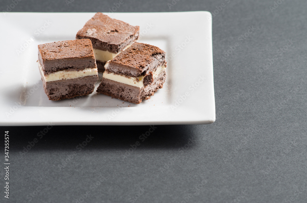 Homemade chocolate ice cream sandwiches cut into bite sized pieces