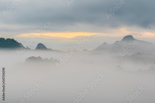Morning mountain landscape view with sea of fog at Baan Ja Bo, Mae Hong Son, Northern Thailand. 